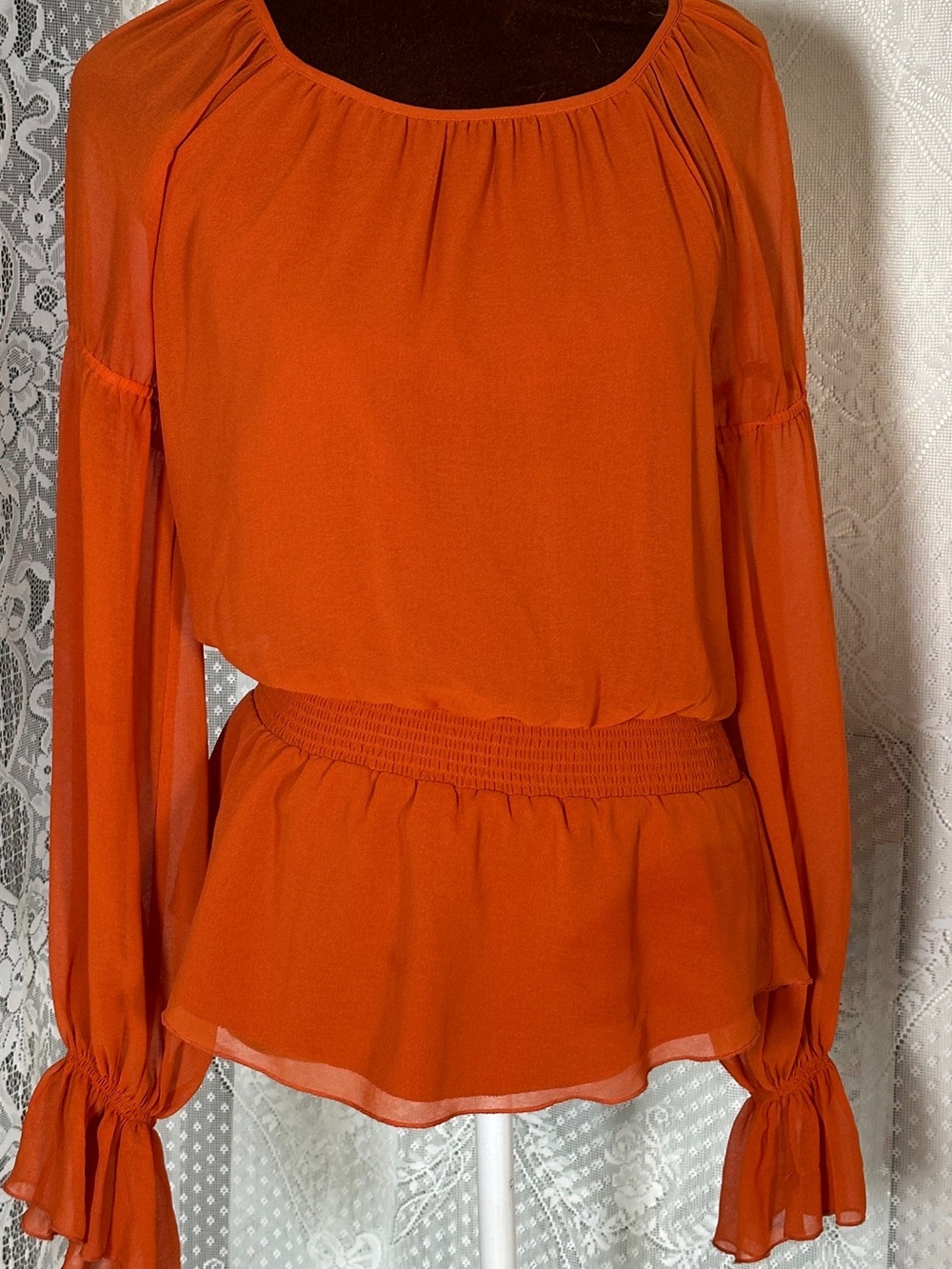 bebe Orange Sheer Long-Sleeve Smocked Peplum Blouse